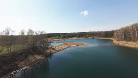 View from above on a blue lake, camera moves slowly, nature trip 動画素材 308907826