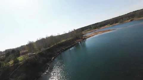 View from above on a blue lake, camera moves slowly, nature trip Stock Footage 308907828