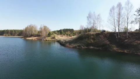 View from above on a blue lake, camera moves slowly, nature trip 動画素材 308907829
