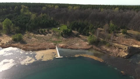 View from above on a blue lake, camera moves slowly, nature trip 動画素材 308907844