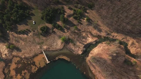 View from above on a blue lake, camera moves slowly, nature trip Stock Footage 308907845