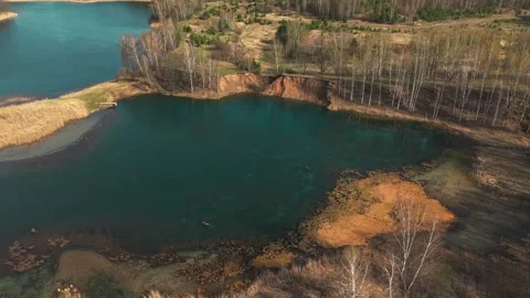 View from above on a blue lake, camera moves slowly, nature trip Stock Footage 308907846