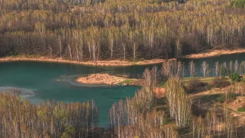 View from above on a blue lake, camera moves slowly, nature trip Stock Footage 308907850