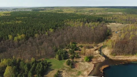 View from above on a blue lake, camera moves slowly, nature trip 動画素材 308907862