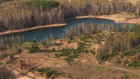 View from above on a blue lake, camera moves slowly, nature trip Stock Footage 308907868