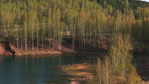 View from above on a blue lake, camera moves slowly, nature trip Stock Footage 308907883