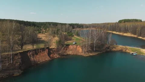 View from above on a blue lake, camera moves slowly, nature trip Stock Footage 308907895