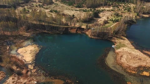 View from above on a blue lake, camera moves slowly, nature trip 動画素材 308907904