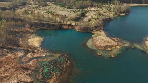 View from above on a blue lake, camera moves slowly, nature trip Stock Footage 308907913