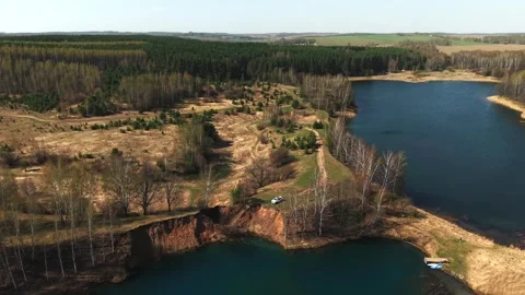 View from above on a blue lake, camera moves slowly, nature trip 動画素材 308907914