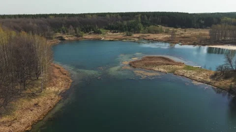 View from above on a blue lake, camera moves slowly, nature trip Stock Footage 308907931