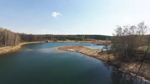 View from above on a blue lake, camera moves slowly, nature trip Stock Footage 308907932