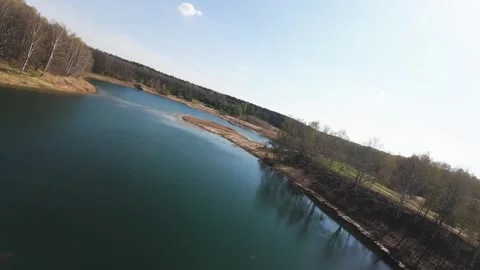 View from above on a blue lake, camera moves slowly, nature trip Stock Footage 308907934