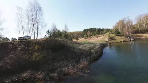 View from above on a blue lake, camera moves slowly, nature trip Stock Footage 308907938
