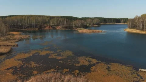 View from above on a blue lake, camera moves slowly, nature trip Stock Footage 308907939