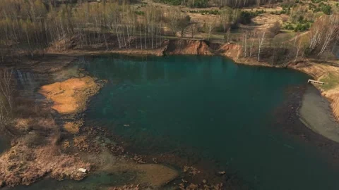 View from above on a blue lake, camera moves slowly, nature trip Stock Footage 308907945