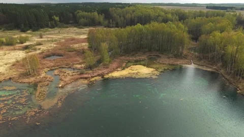 View from above on a blue lake, camera moves slowly, nature trip Stock Footage 308907951