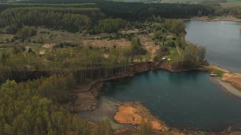View from above on a blue lake, camera moves slowly, nature trip Stock Footage 308907954