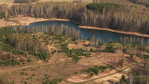 View from above on a blue lake, camera moves slowly, nature trip Stock Footage 308907960