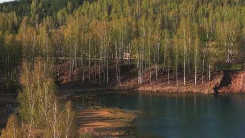 View from above on a blue lake, camera moves slowly, nature trip Stock Footage 308907964