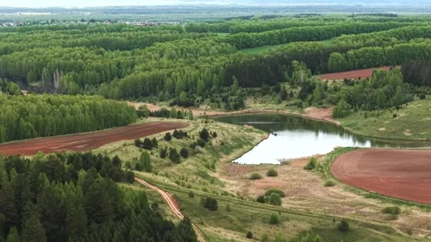 View from above on a blue lake, camera moves slowly, nature trip Stock Footage 308907984