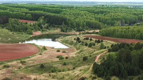 View from above on a blue lake, camera moves slowly, nature trip Stock Footage 308907988