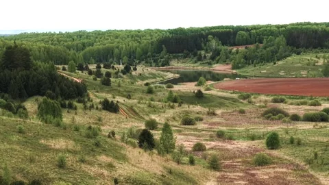 View from above on a blue lake, camera moves slowly, nature trip Stock Footage 308907995