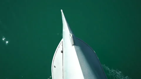 View from above. The bow of the ship is cut by the waves of the calm sea. Stock Footage 169670062