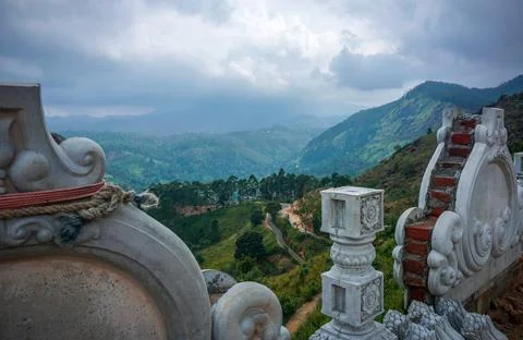 View from above, from Buddhist temple wall to the green mountains, pathway, t Stock Photos
