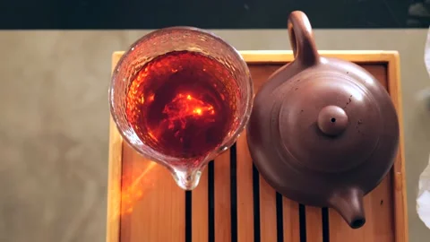 View from above. Chinese tea ceremony. Pu-erh tea in a glass bowl. 4k. Stock Footage 218447558