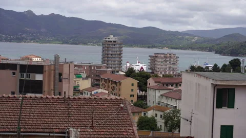View from above of the city rooftops and the sea. Stock Footage 329460344
