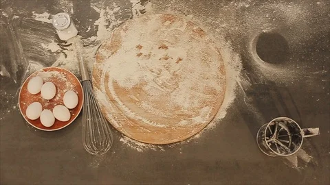 View from above. Closeup of female hands put fresh bread on the table. the flour 스톡 동영상 103253003