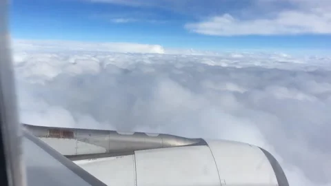 The view above the clouds from the airplane window Stock Footage 162247778