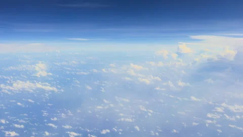 View above the clouds from an airplane window Stock Footage 297520737