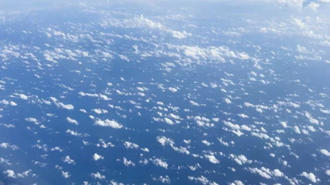 View above the clouds from an airplane window Stock Footage 297520762