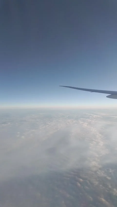 View Above Clouds from Airplane Window. Stock Footage 327776181