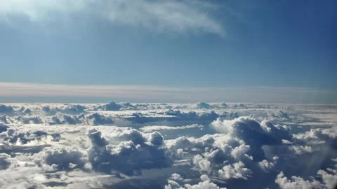 View Above Clouds from Airplane Window. Stock Footage 328995515