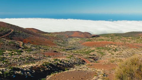 The view above the clouds and forest from a high mountain. Panorama view above Stock Footage 121621656