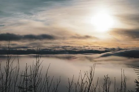 View from above the clouds with sunset from top of the mountain Stock Photos