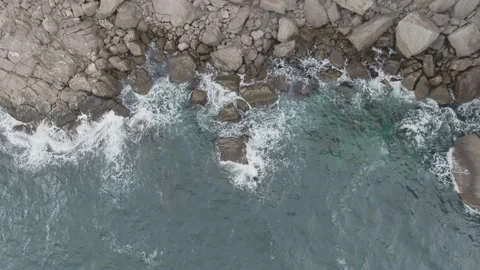 View from above on the coastal cliffs about which the sea waves beat Stock-Footage 132167997