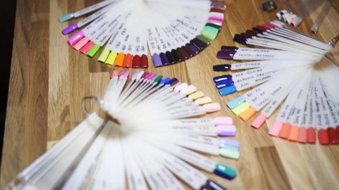 View from above on a collection of professional multicolored of nail polish Stock Footage 93987067