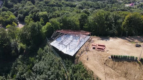 View from above on the construction of a small restaurant or house in the woods Stock Footage 195243322