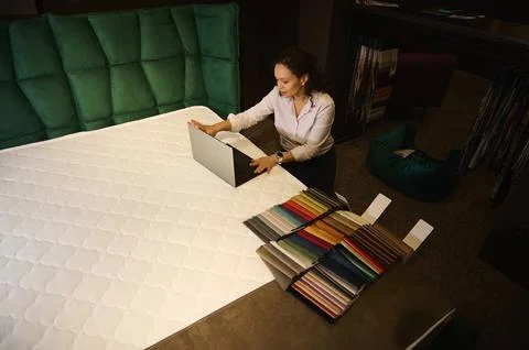 View from above of a creative inspired Hispanic woman- interior designer work Stock Photos