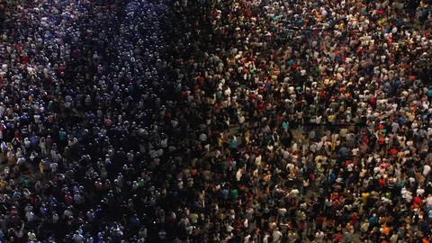 View above dancing crowd, spectators outdoor. Stock Footage 129002487