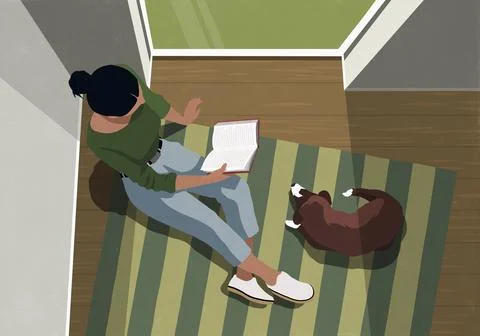 View from above of dog laying next to woman reading a book on a striped rug by a Stock Illustration