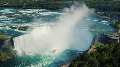 A view from above of the famous Niagara River and a waterfall in the shape of a Stock Footage 83004301