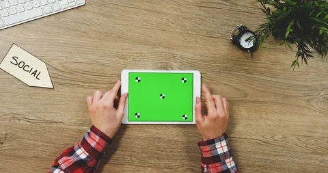 View from above on the female hands using the white horizontal tablet computer Stock Footage 89961767