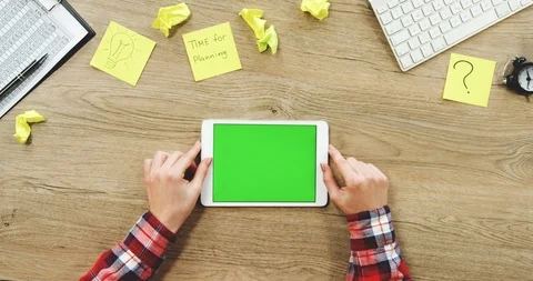 View from above on the female hands using the white horizontal tablet device Stock Footage 89965010