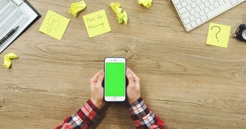 View from above on the female hands using the white vertical smartphone with a 스톡 동영상 89966575