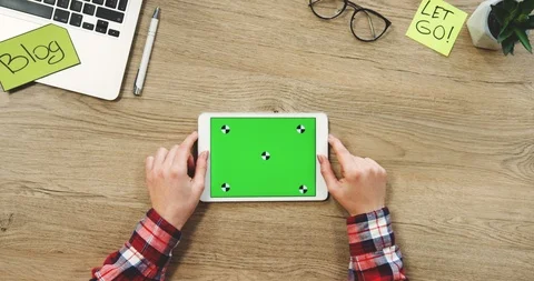 View from above on the female hands using the white horizontal tablet computer 스톡 동영상 89970465